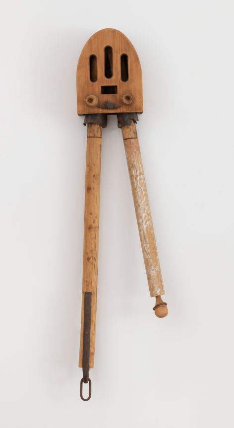 John Outterbridge, "Good News", 1993, mixed media, 47 x 8 1/2 x 7 inches (119 x 22 x 18 cm). A hanging sculpture by John Outterbridge.