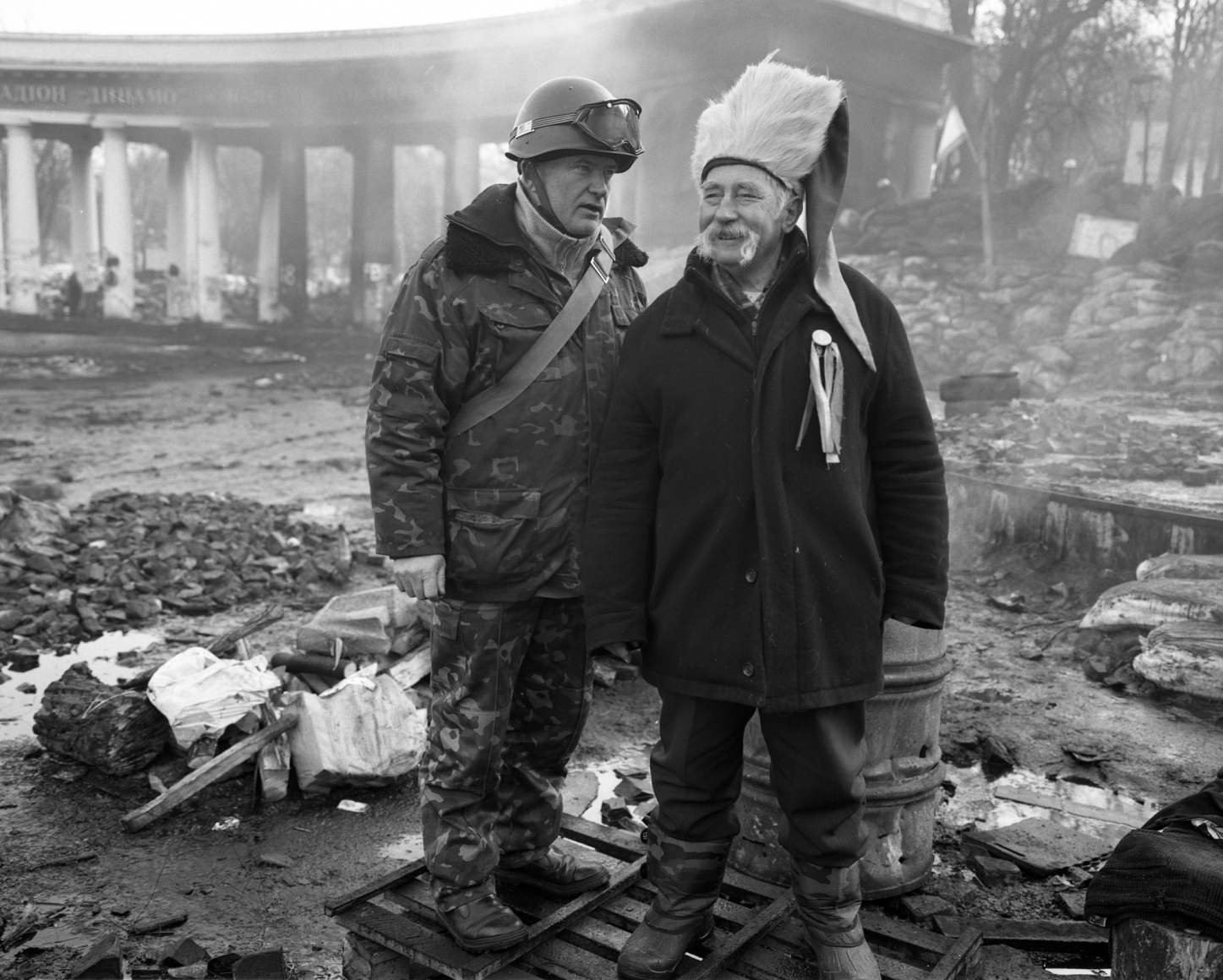 Pavel Wolberg, Untitled, Soldier & Man (Kiev, 11 February), 2014, Archival Pigment Print