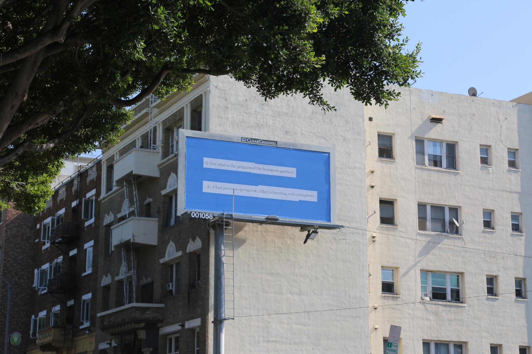 Larry Johnson, Q&A 2020. Billboard at W. Seventh St. and S. Rampart Blvd., Los Angeles 90057 (facing south). 144 × 288 in. (365.8 × 731.5 cm). Courtesy of the artist, David Kordansky Gallery, Los Angeles, and 303 Gallery, New York. Installation view, co-produced by The Billboard Creative for Made in L.A. 2020: a version. Photo: Joshua White / JWPictures.com