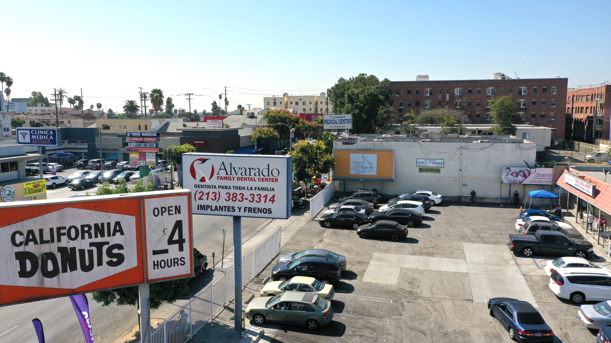 Larry Johnson, Palmistry 2, 2020. Billboard at W. Eighth St. and S. Alvarado St., Los Angeles, 90057 (facing north). 144 × 288 in. (365.8 × 731.5 cm). Courtesy of the artist, David Kordansky Gallery, Los Angeles, and 303 Gallery, New York. Installation view, co-produced by The Billboard Creative for Made in L.A. 2020: a version. Photo: Joshua White / JWPictures.com