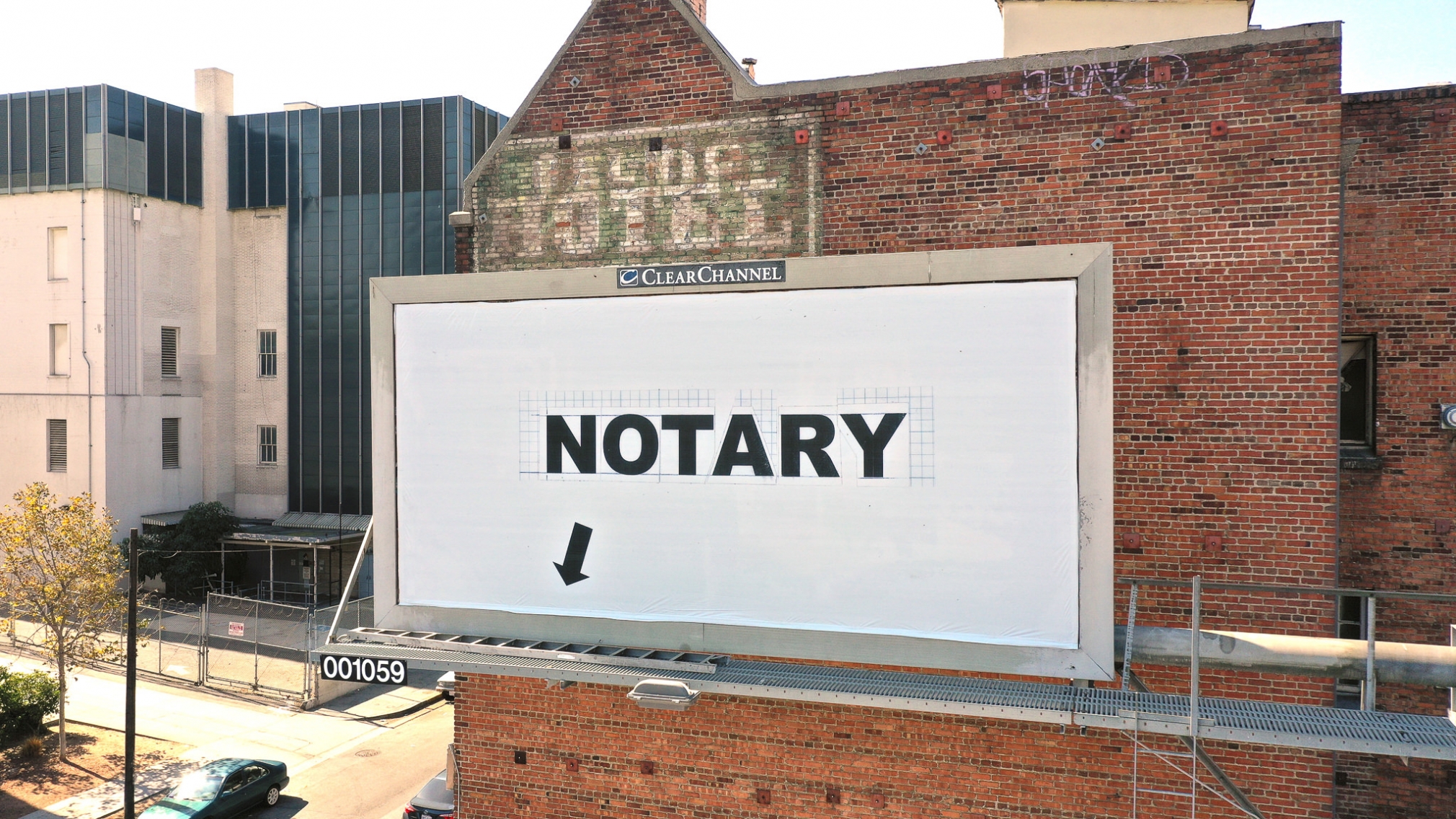 Larry Johnson, Notary, 2020. Billboard at S. Rampart Blvd. and W. Seventh St., Los Angeles 90057 (facing north). 144 × 288 in. (365.8 × 731.5 cm). Courtesy of the artist, David Kordansky Gallery, Los Angeles, and 303 Gallery, New York. Installation view, co-produced by The Billboard Creative for Made in L.A. 2020: a version. Photo: Joshua White / JWPictures.com
