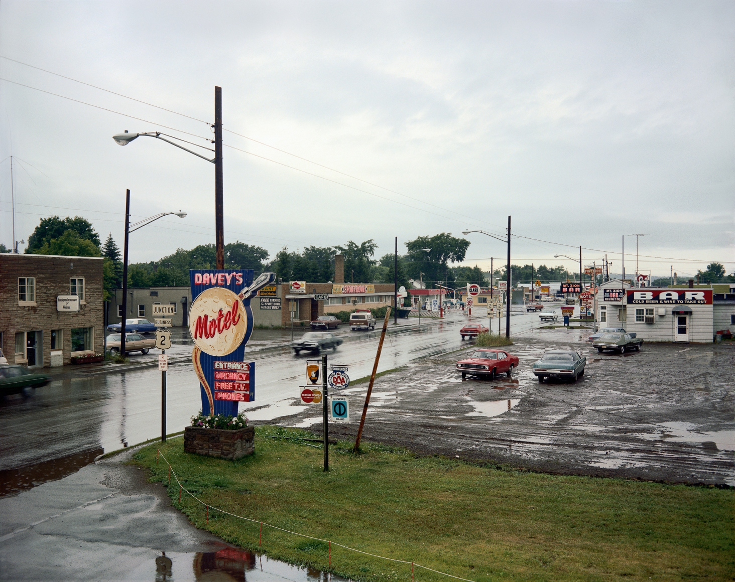 Stephen Shore, U.S. 2, Ironwood, Michigan, July 9, 1973