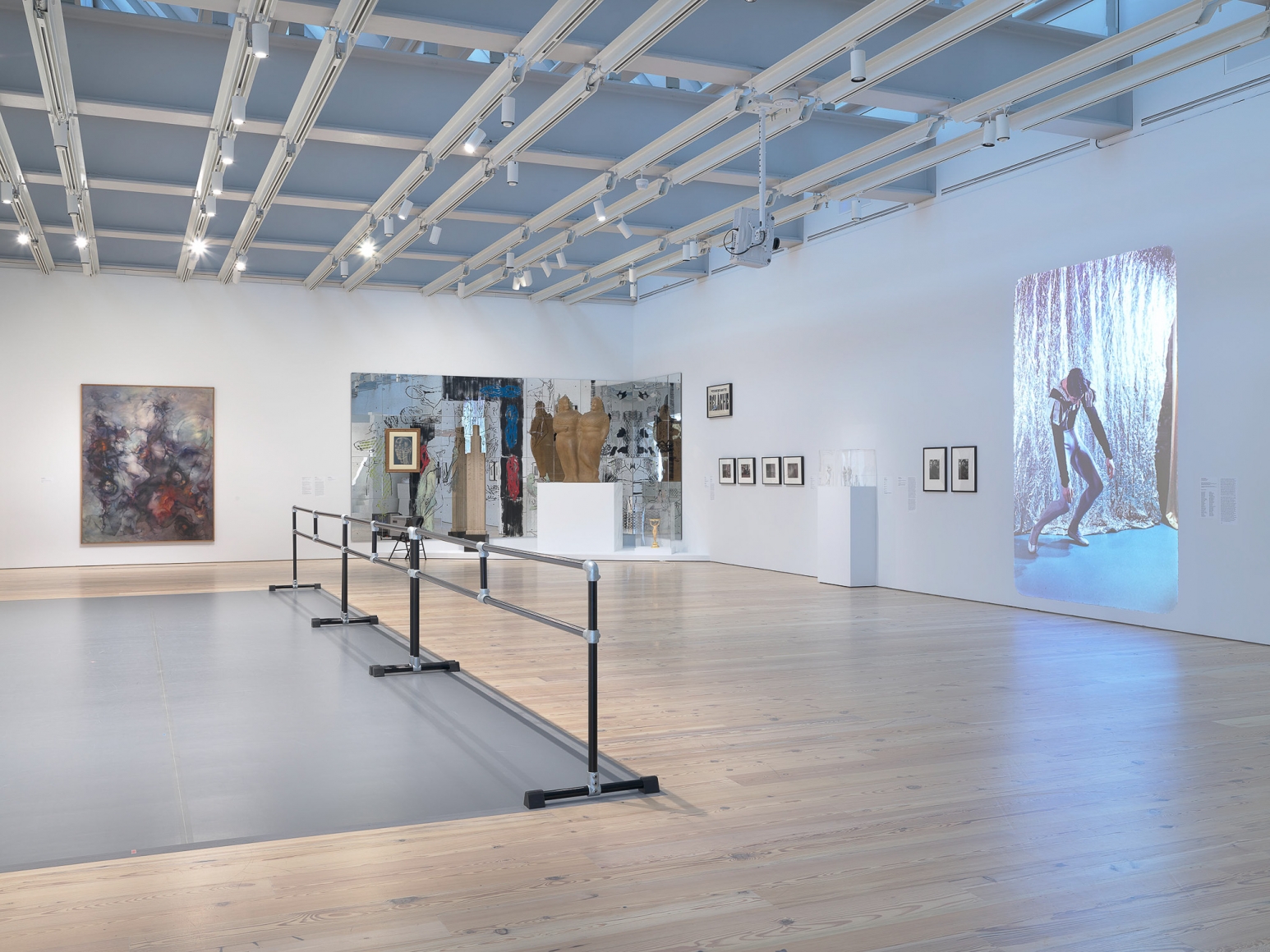 Installation view of Nick Mauss: Transmissions, Whitney Museum of American Art, New York, 3/16 - 5/14/2018, Left to right: Dorthea Tanning, Aux environs de Paris (Paris and Vicinity), 1962; Nick Mauss, Images in Mind, 2018; Documentation of George Balachine chorerography in rehearsals, 1951-58; Pavel Tchelitchew, Interior Landscape Skull, 1949; John Storrs, Forms in Space #1, c. 1924; Elie Nadelman, Two Circus Women, c. 1928-29; Gustav Natorp figure (formerly owned by Lincoln Kirstein), 1898; Sturtevant, Relâche, 1967; Ilse Bing, Untitled (Skyscrapers, night, NY), 1936; Ilse Bing, Dead End II, 1936.; Ilse Bing, Three Birds in the Sky, Paris, 1936; Ilse Bing, Between France and U.S.A. (Seascapes), 1936; Elie Nadleman, Untitled, c. 1938-46; Elie Nadelman, Untitled, c. 1938-46; Elie Nadelman, Untitled, c. 1938-46; Elie Nadelman, Untitled, c. 1938-46; Carl Van Vechten, Al Bledger of the Von Grona (American) Negro Ballet, 1938; Carl Van Vechten, Al Bledger of the Von Grona (American) Negro Ballet, 1938; Carl Van Vechten, Carl Van Vechten slideshow, 1940-64. Photograph by Ron Amstutz. Digital image © Whitney Museum of American Art, New York