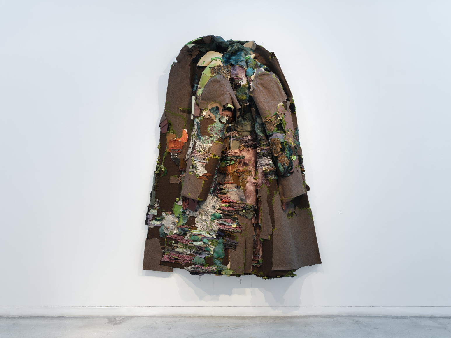 Ruby Chishti An intangible sanctuary of ocean and starts II 2020 Men’s vintage wool overcoat, cloth, thread flicking powder, wood, paint, archival glue, dried moss 100h x 74w x 14d in