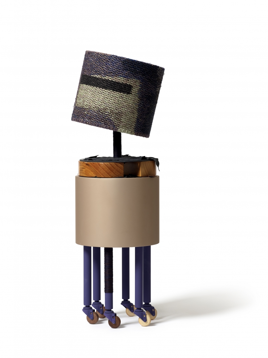 Suki Seokyeong Kang (b.1977) Narrow Meadow #19-10, 2018-2019 Assembled units: painted steel, thread, tree trunk, leather scraps, nail, wooden wheels 42.52 x Ø 13.39 inches 108 x Ø 34 cm