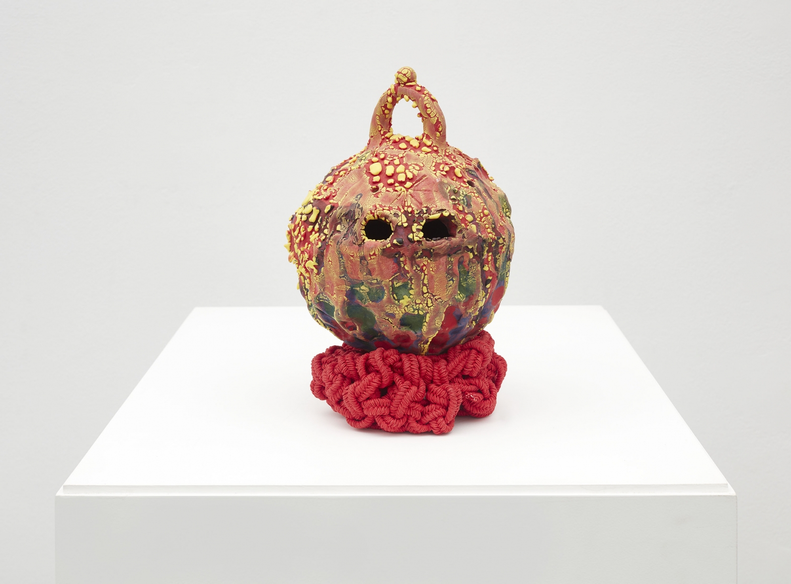 Ceramic work resting on top of crocheted fiber by ektor garcia