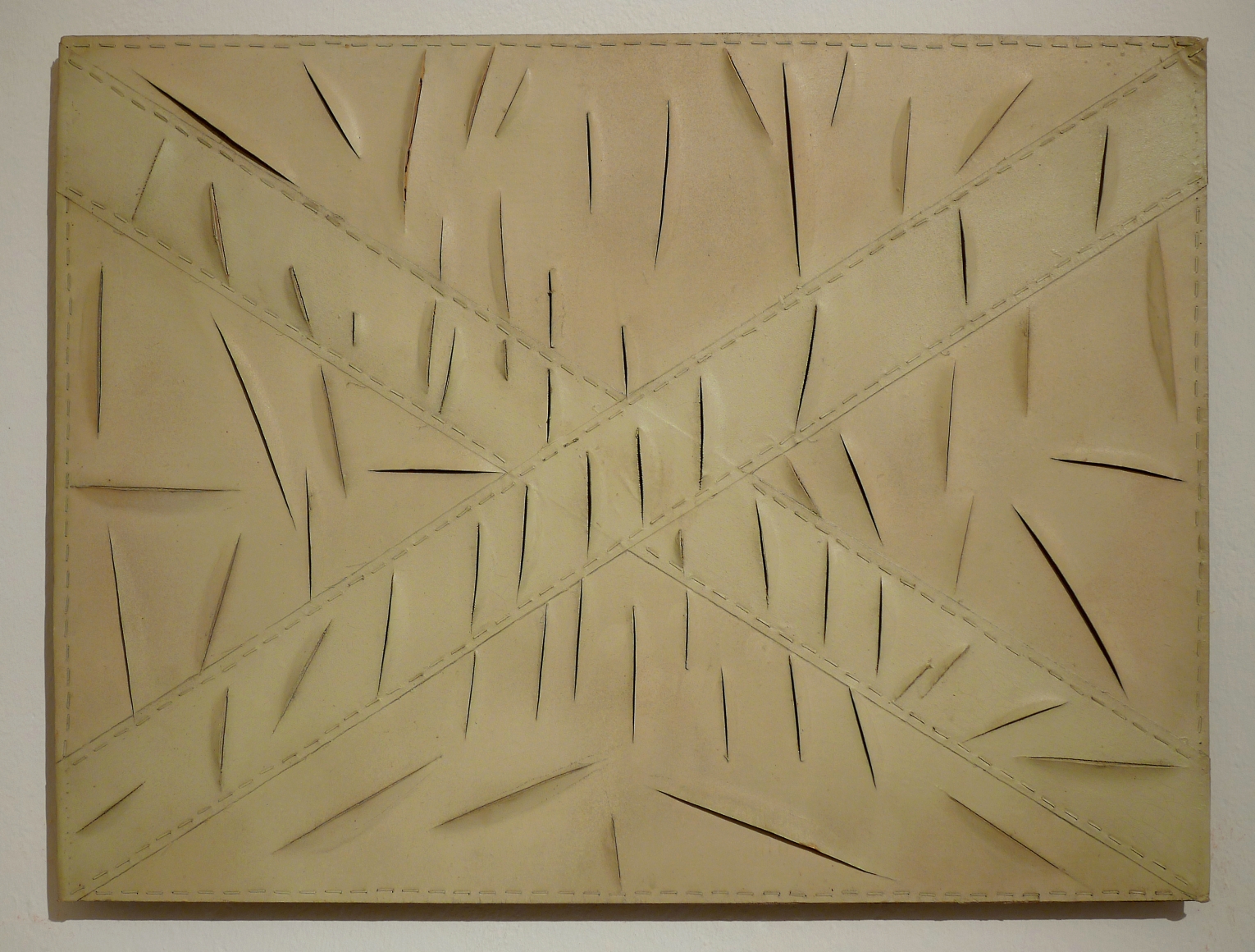 a painting with slashes by italian artist salvatore scarpitta