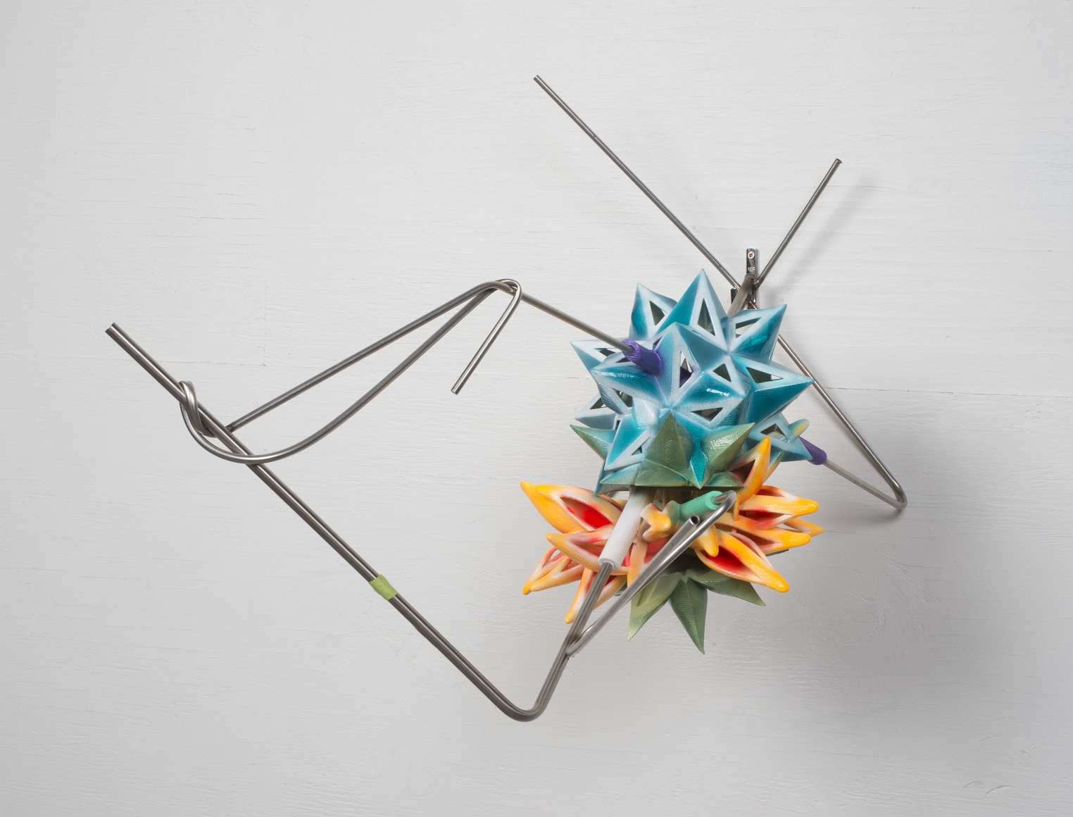 a plastic 3-d printed sculpture by frank stella of geometric, colorful stars