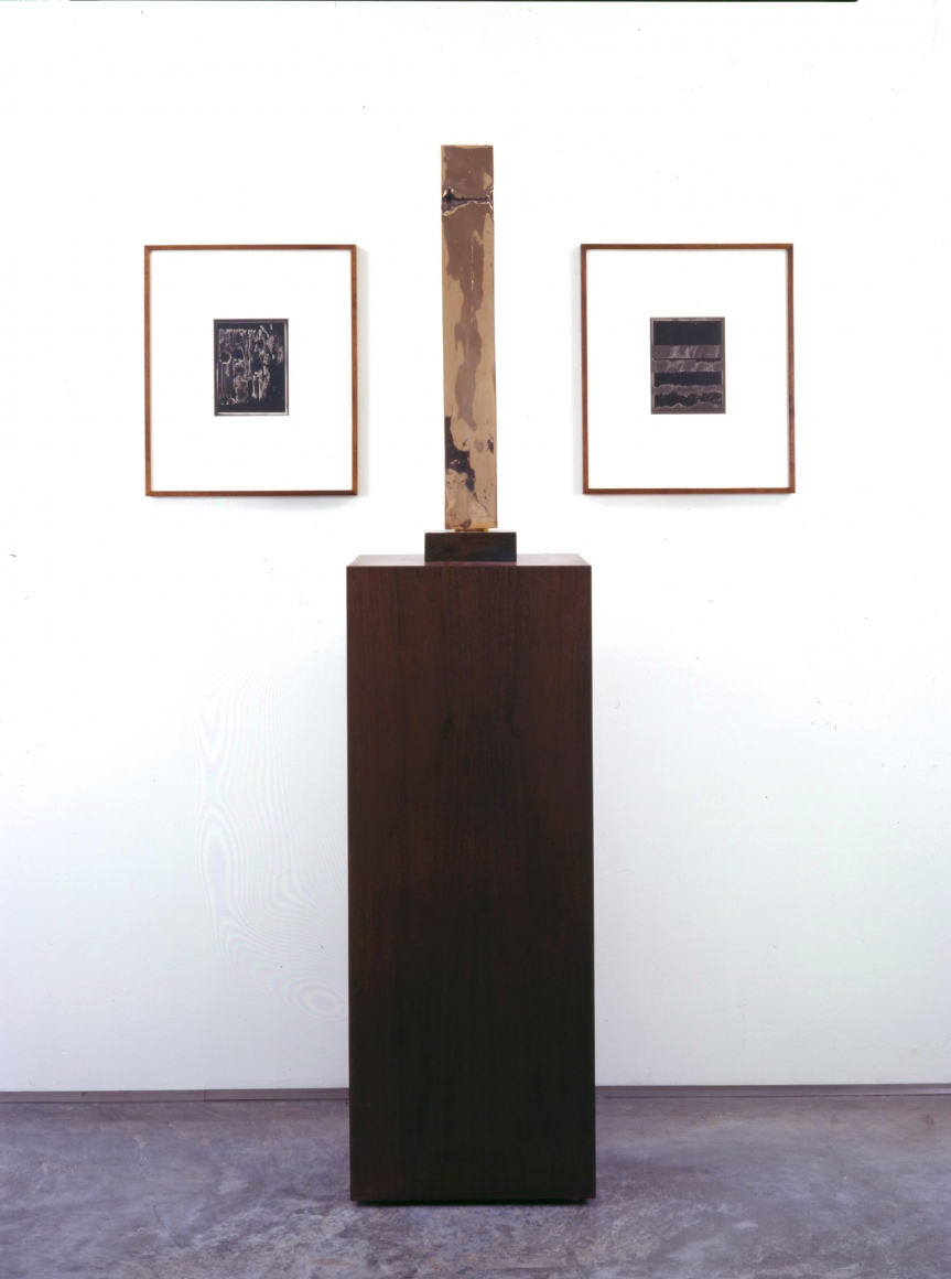 installation by anthony pearson with rectangular sculpture flanked by two photographs
