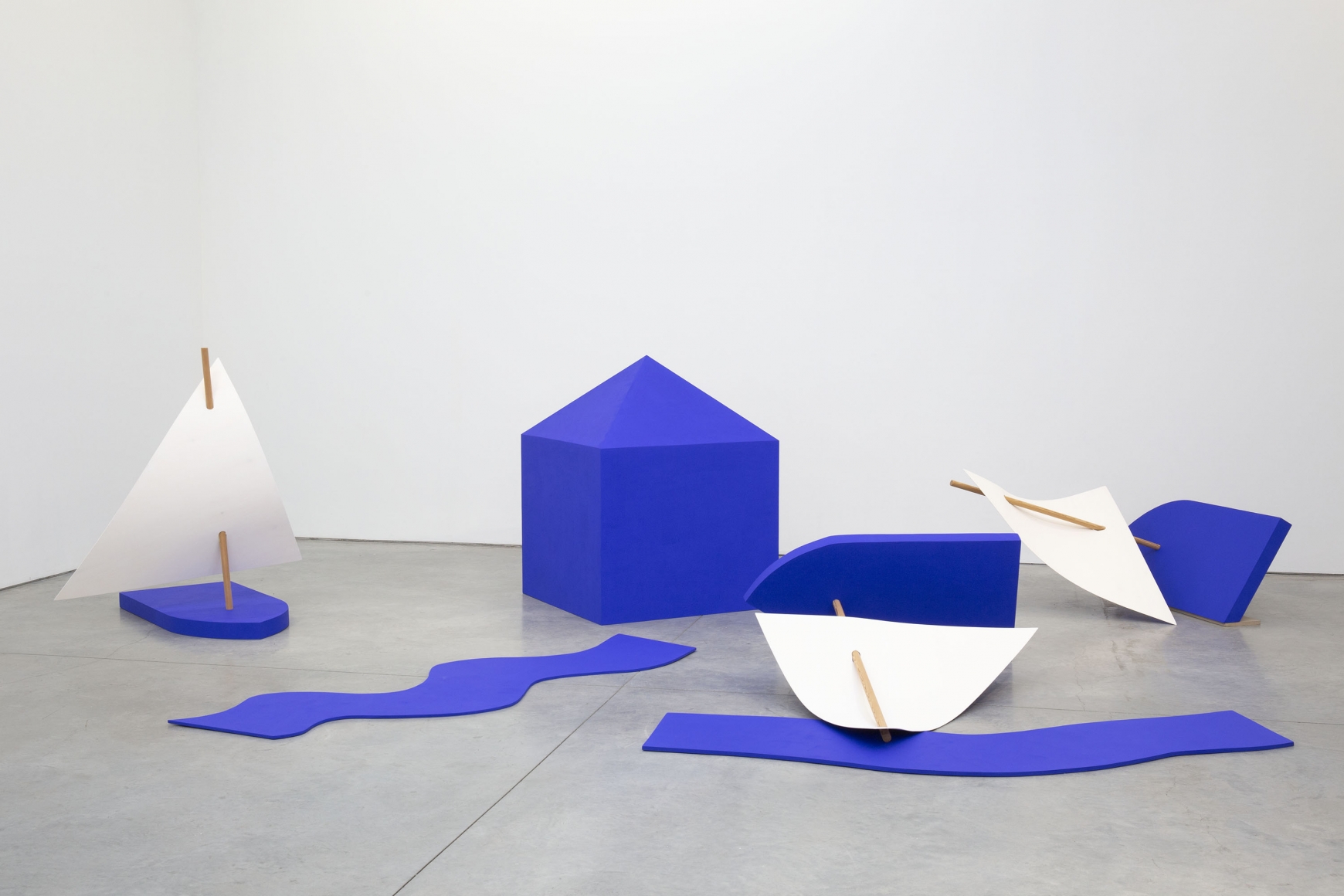 Sculpture of sail boats and a house by Jennifer Bartlett