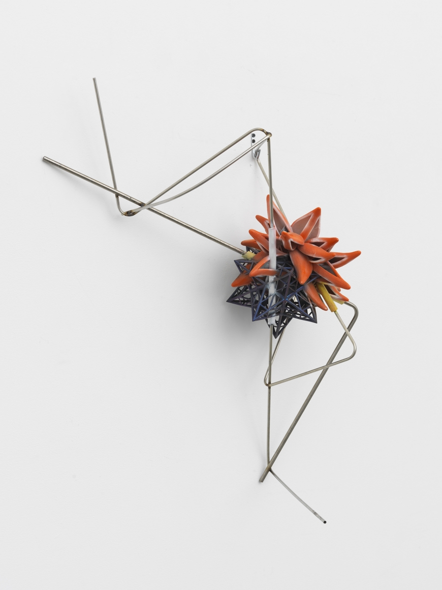 a colorful 3-d printed artwork by frank stella on view in a chelsea art gallery