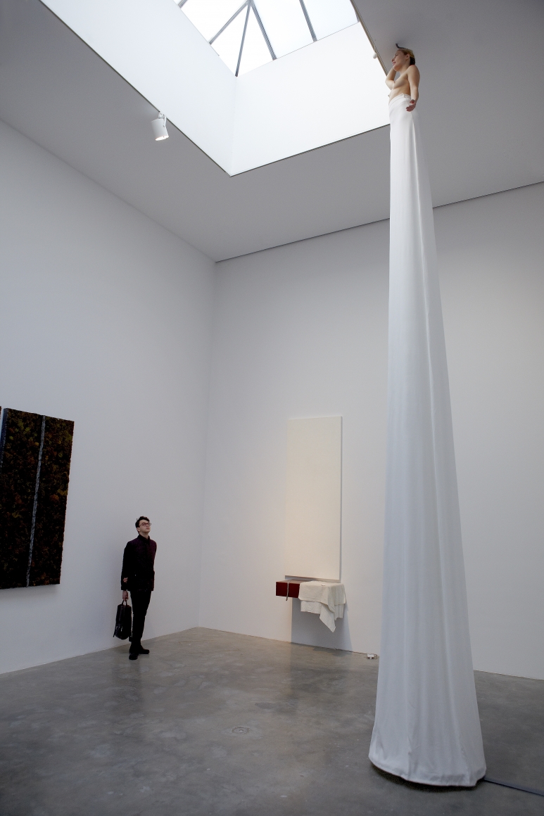 sculpture of a towering female figure by pier paolo calzolari