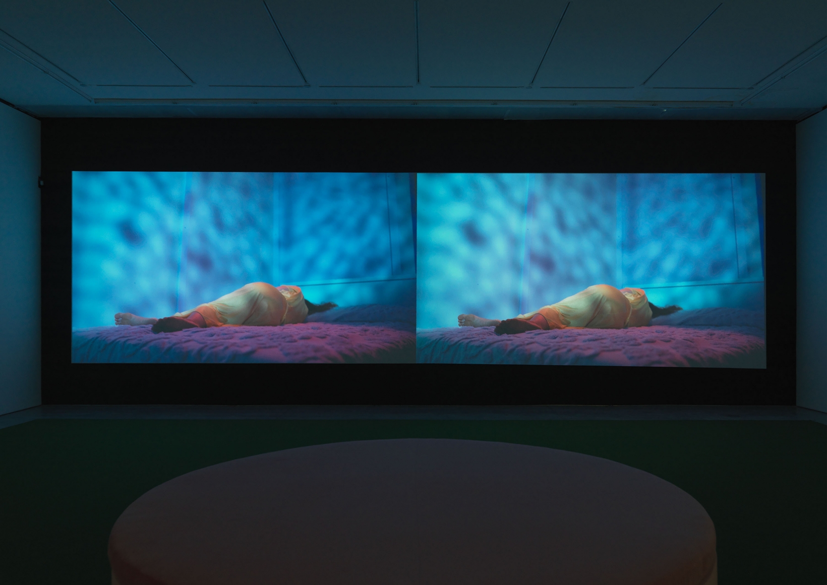 a two channel film by sue de beer showing in a new york art gallery