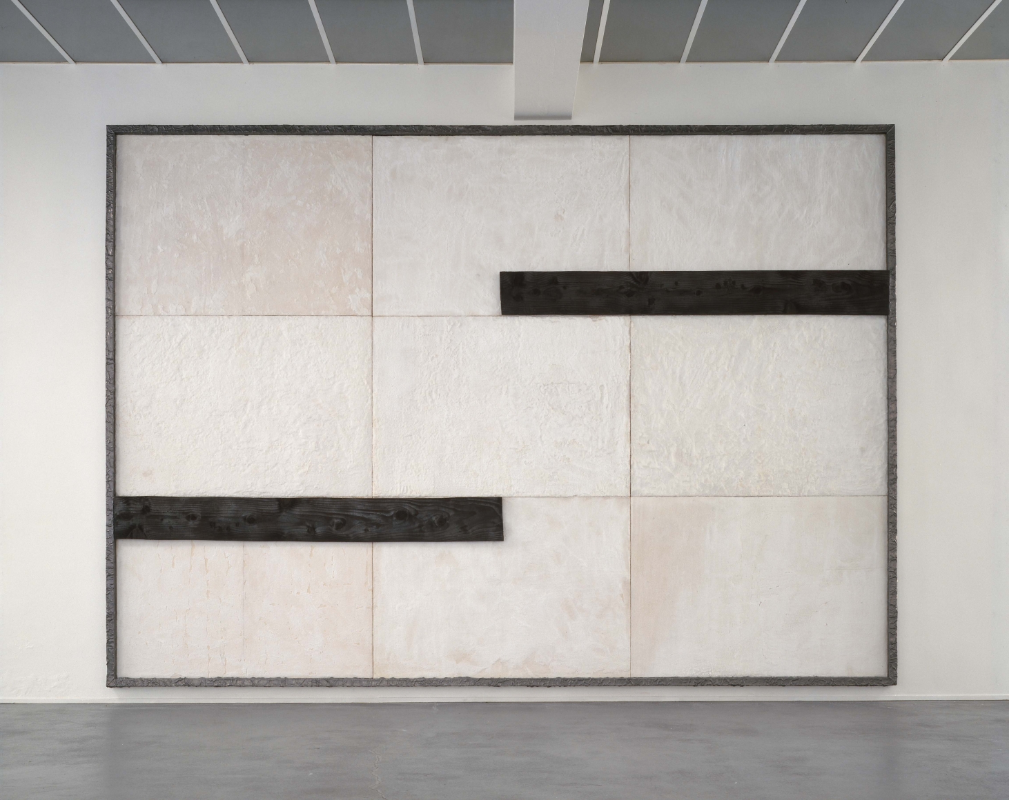 white and black grid painting made of wood, salt, and lead by pier paolo calzolari