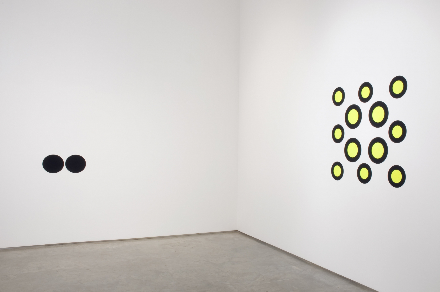 yellow and black dots painted on wall by neil campbell