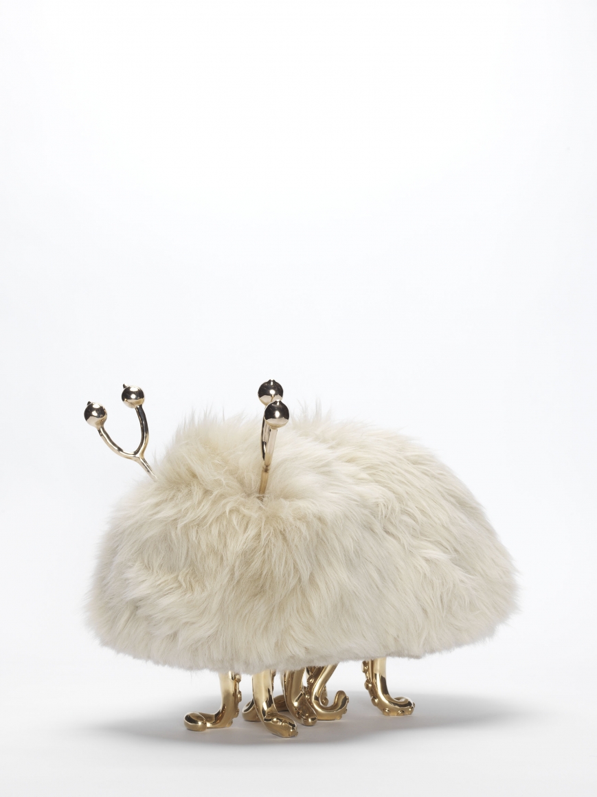 Sculpture made of stone sheepskin with brass squid legs and horns by the artists the haas brothers