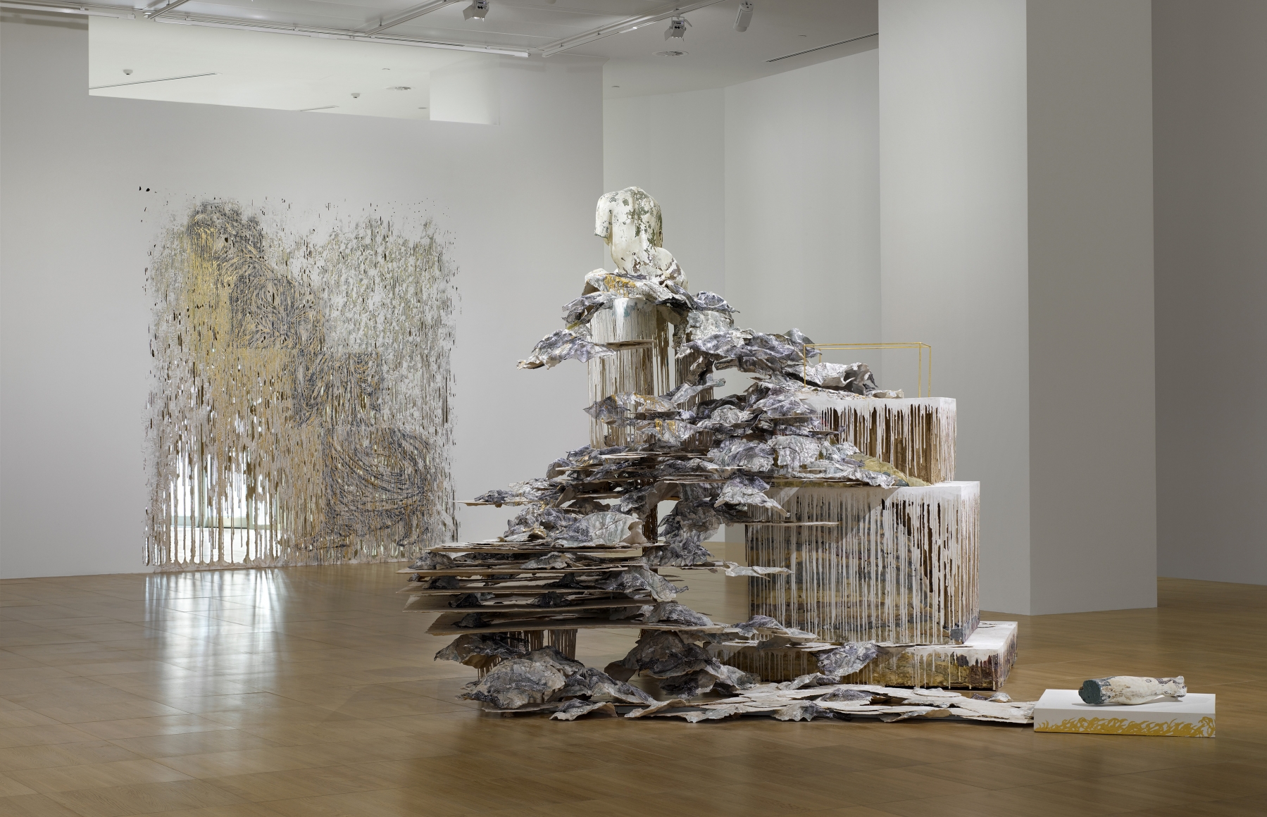 a view of a contemporary art gallery exhibiting the works of Diana Al-Hadid