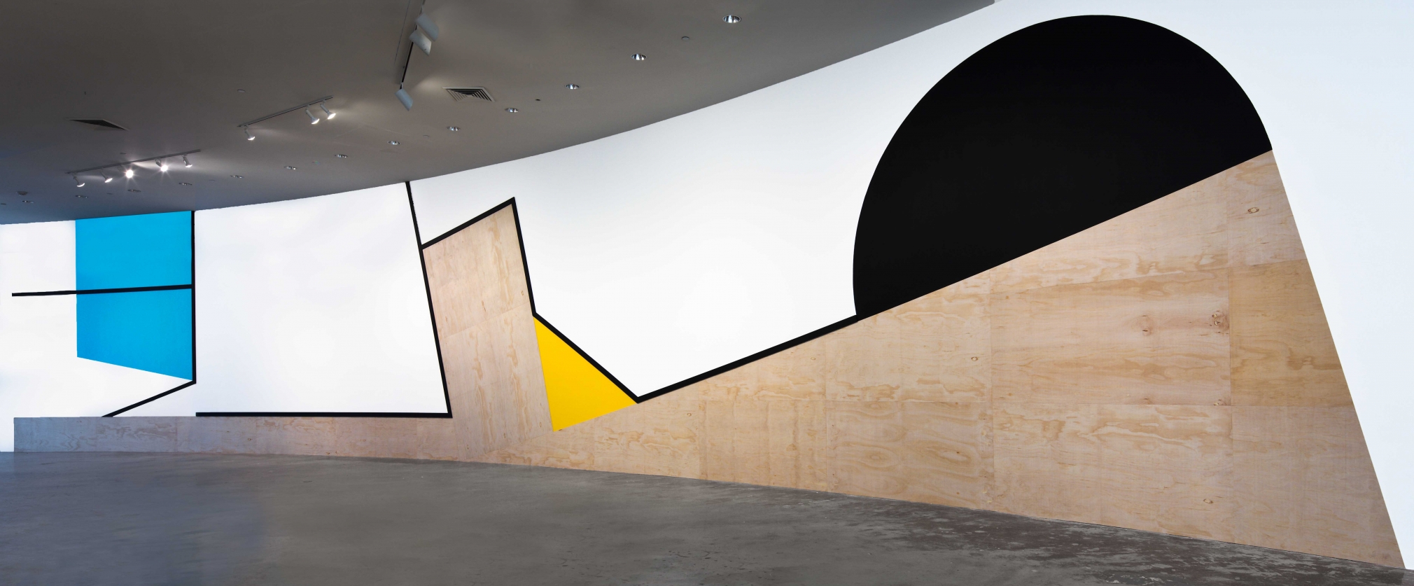 large abstract geometric artwork in a florida museum by serge alain nitegeka