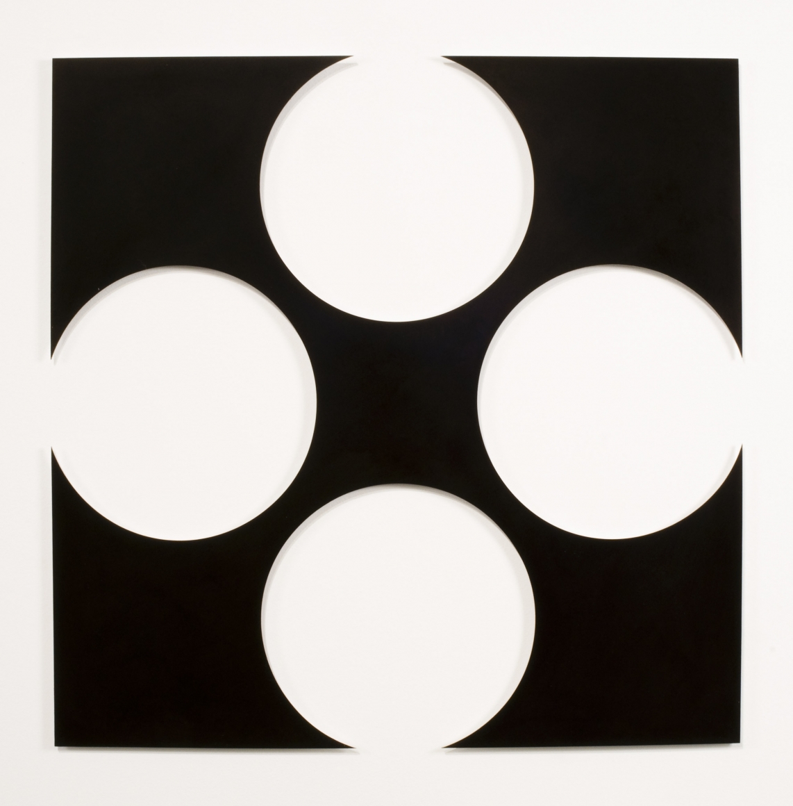 four yellow circles against white background by neil campbell