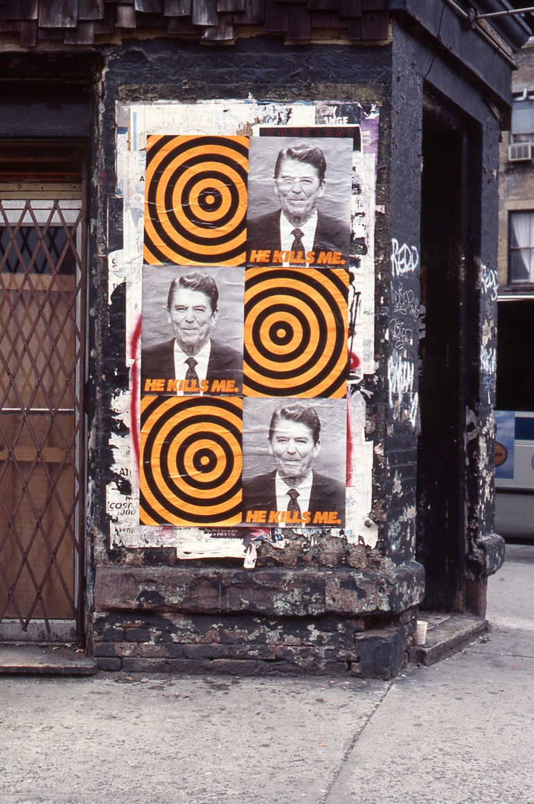 outdoor public installation of donald moffett's political art featuring ronald reagan