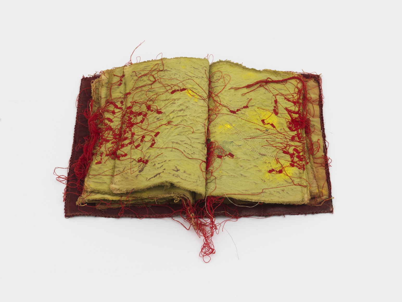 a fabric book by artist Maria Lai for sale at a new york city gallery