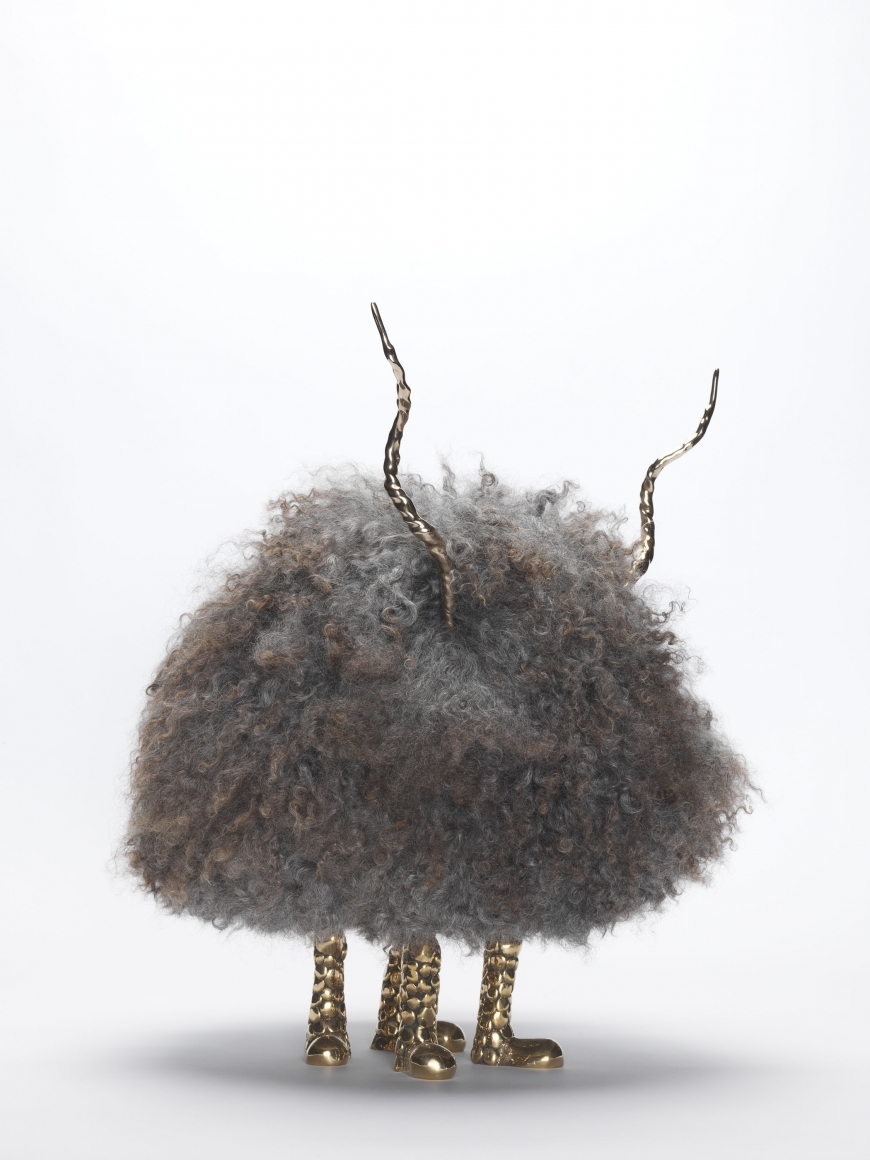 Sculpture made of gotland fur with brass legs and horns by the artists the haas brothers