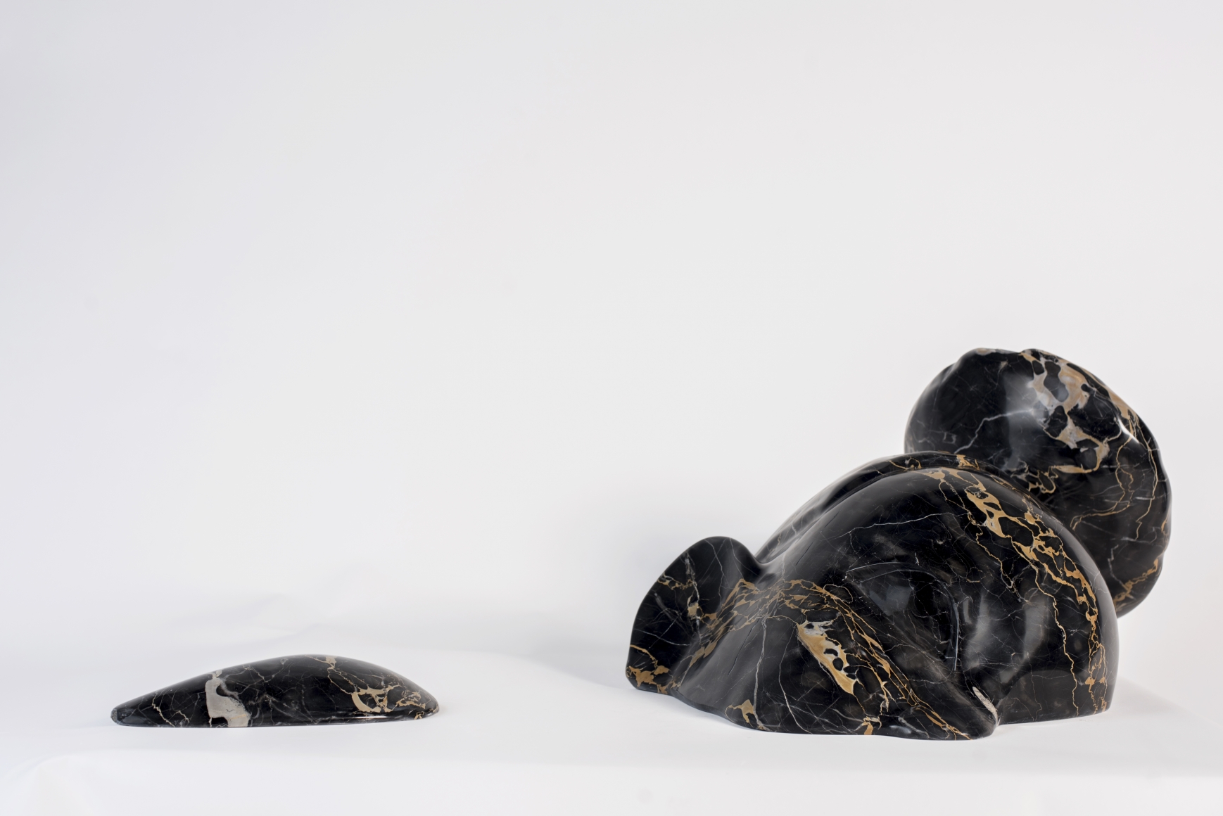 a marble sculpture by the artist Sanford Biggers