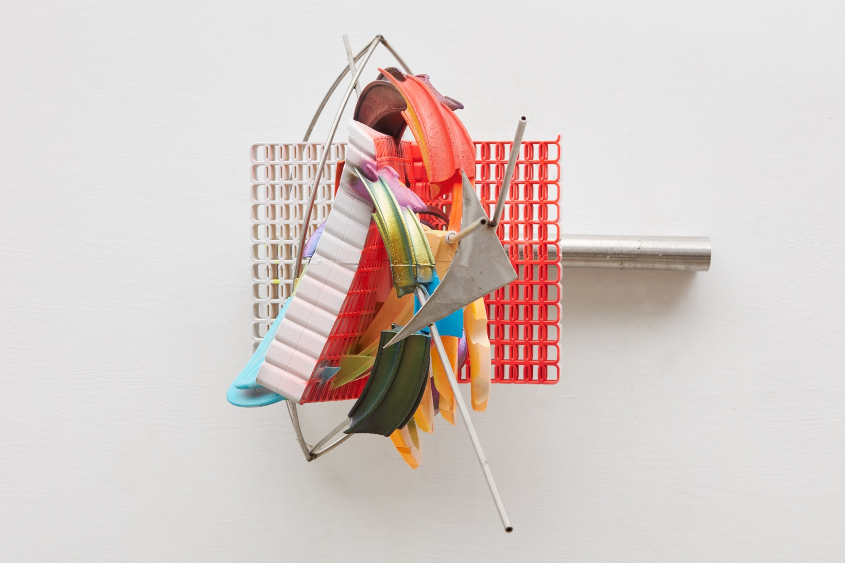 a 3-d printed artwork by frank stella of geometric forms in a nyc gallery