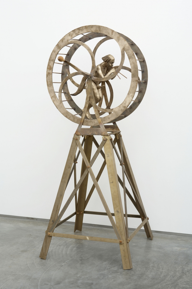sculpture with satyr in an orb on a tripod by pentti monkkonen