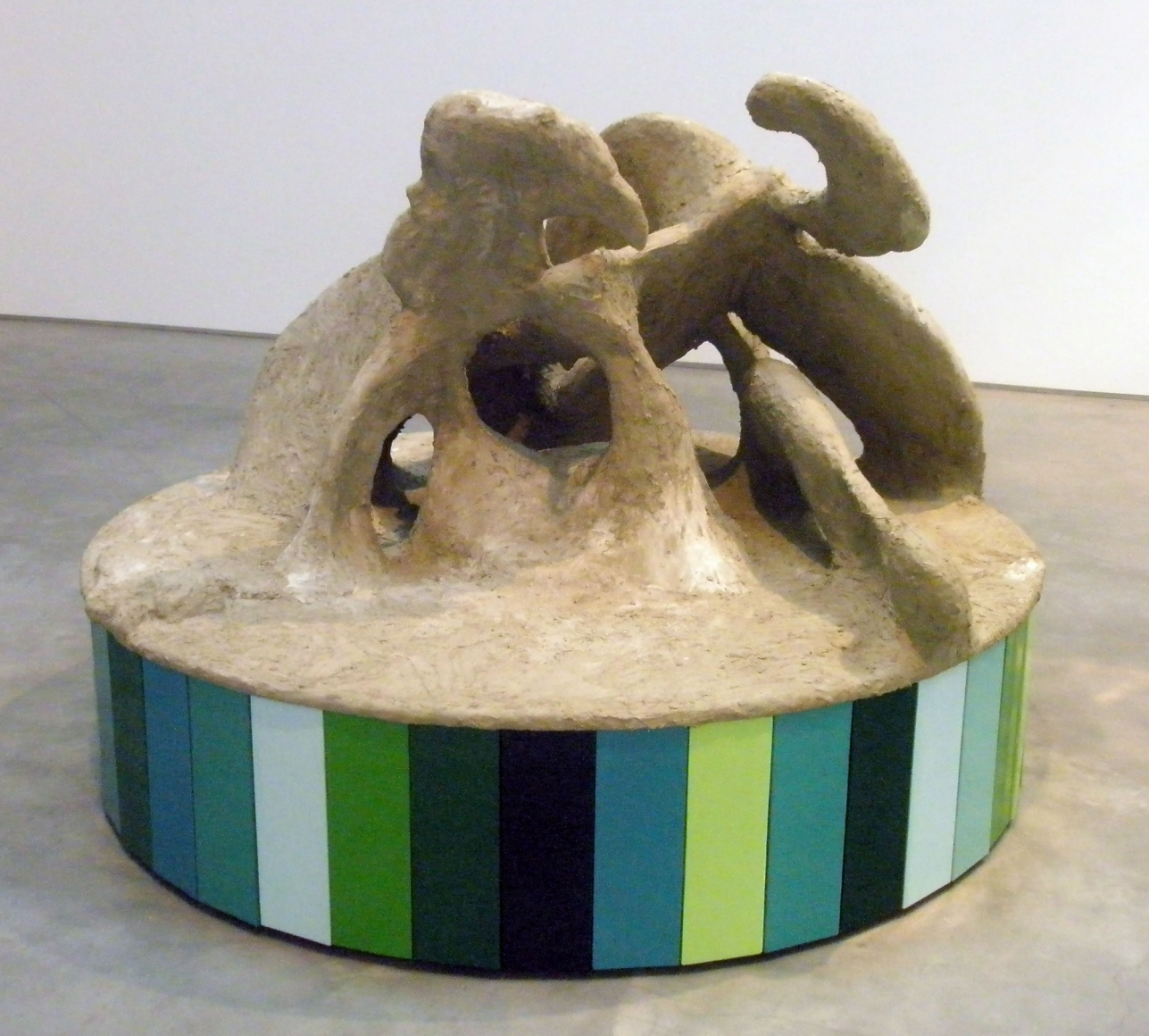 circular blue, green, and concrete sculpture by rachel feinstein