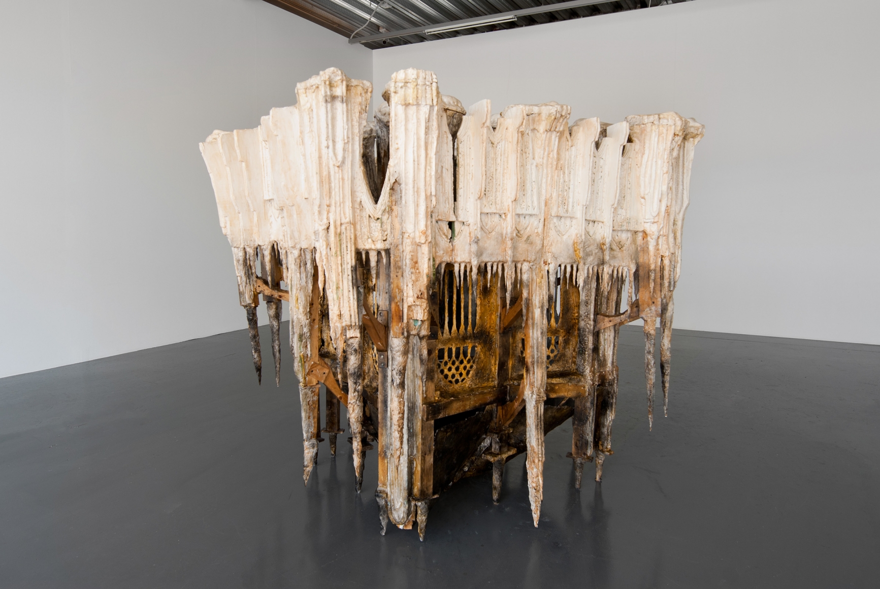 a sculpture by Diana Al-Hadid in a gallery on exhibition