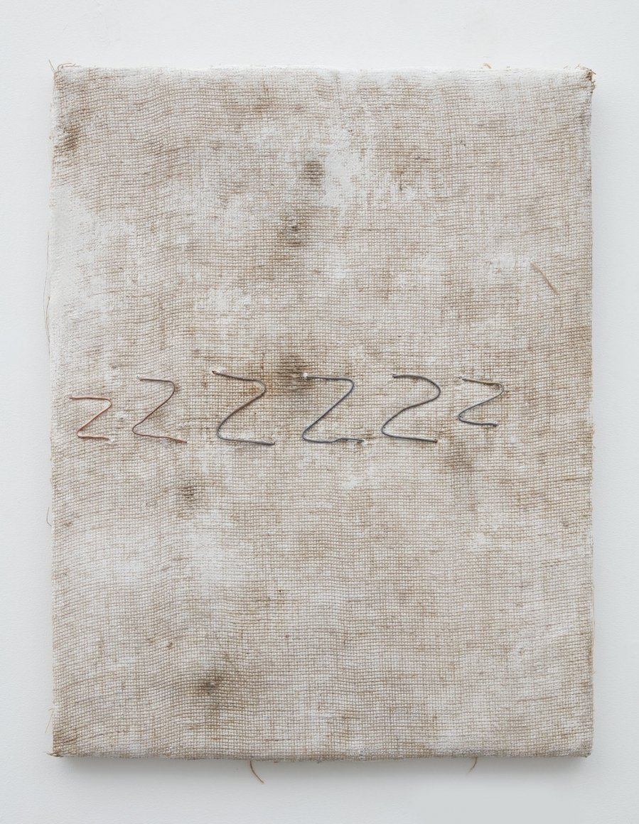 a cream-colored dyed burlap artwork by the minneapolis-based artist jay heikes