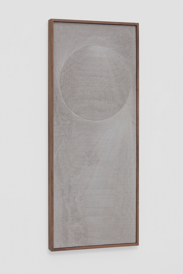 an angled view of an etched plaster work by anthony pearson, a contemporary artist