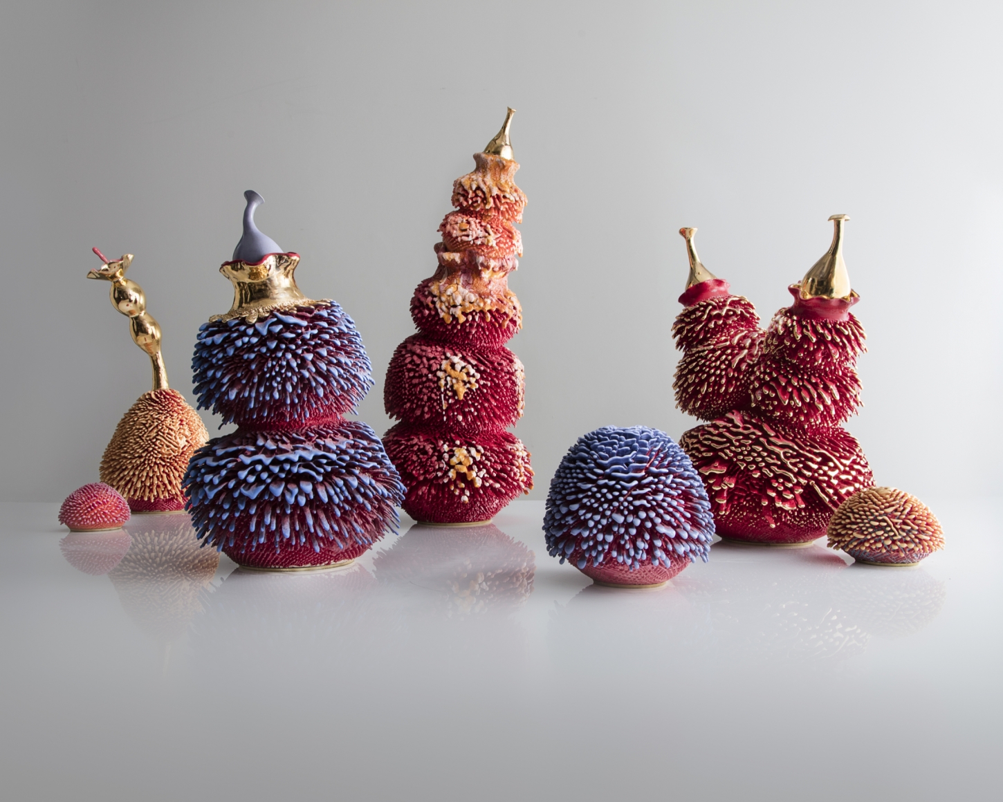 exhibition of accretion sculptures on view at a New York City gallery