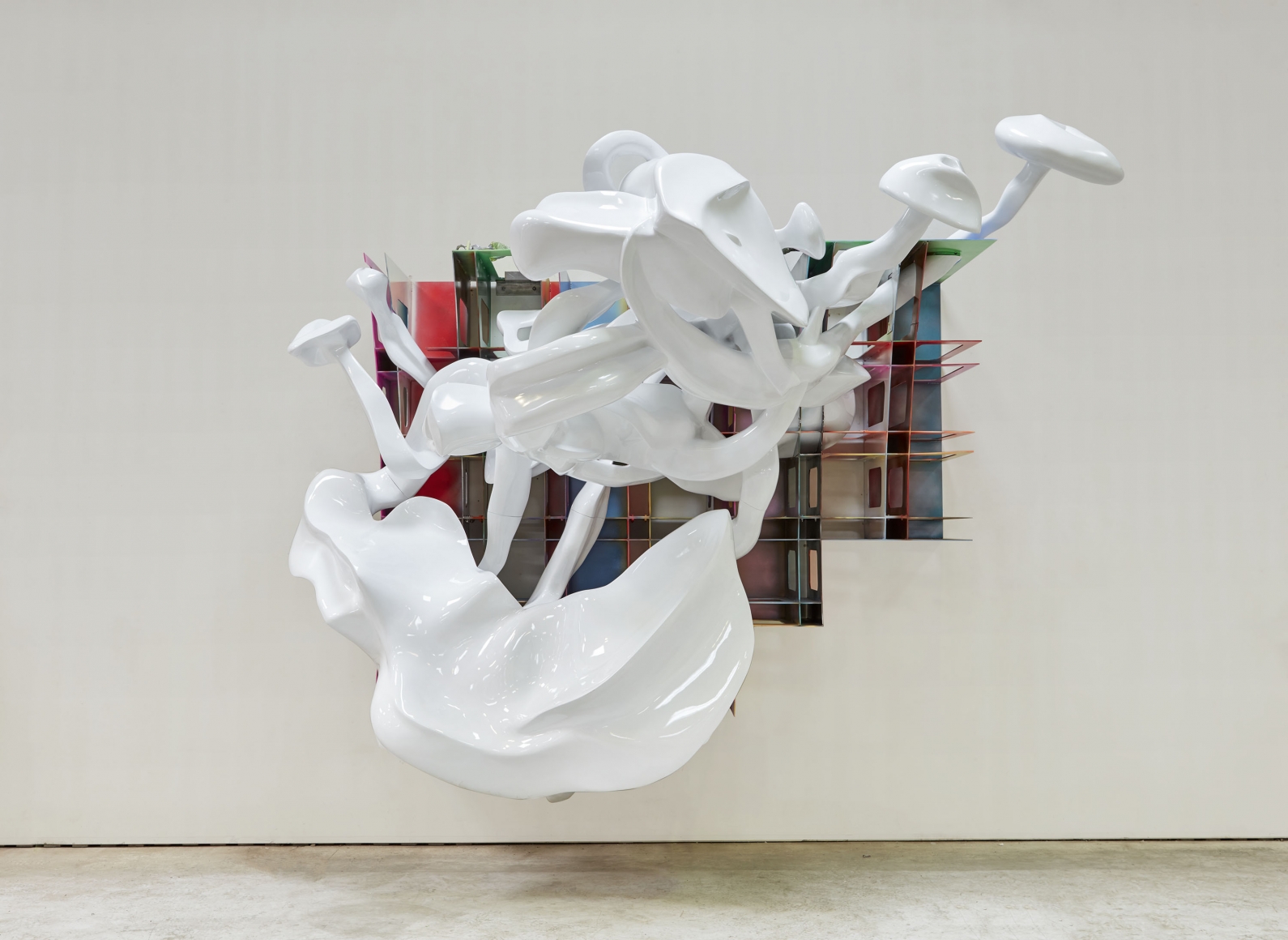 a large sculpture with smoke rings by frank stella