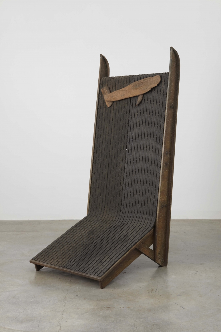 a rubber and wood sculpture by arte povera italian artist salvatore scarpitta