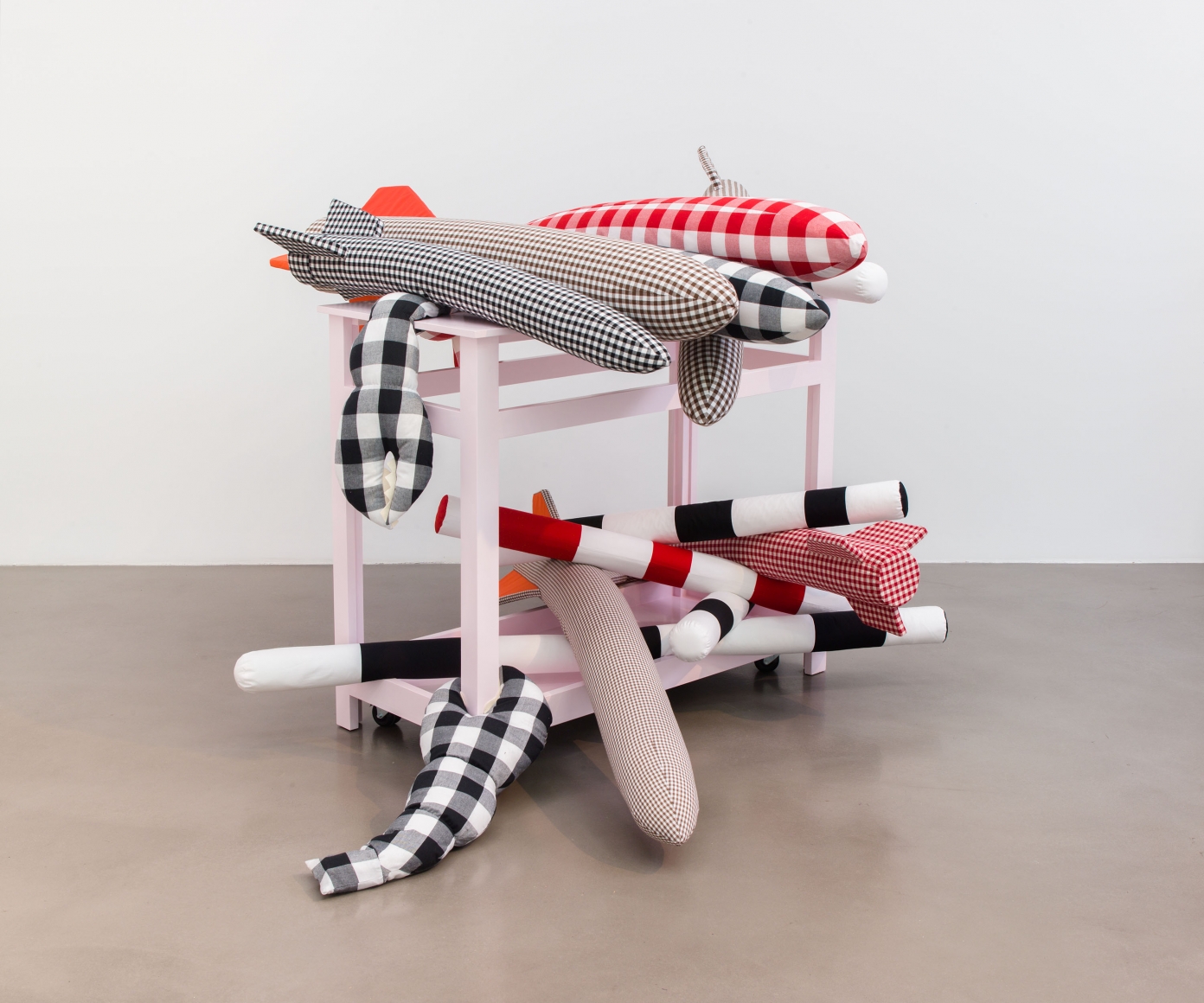 Cosima von Bonin, Au Pairs, 2018, Cotton and wool covering cardboard, wooden table