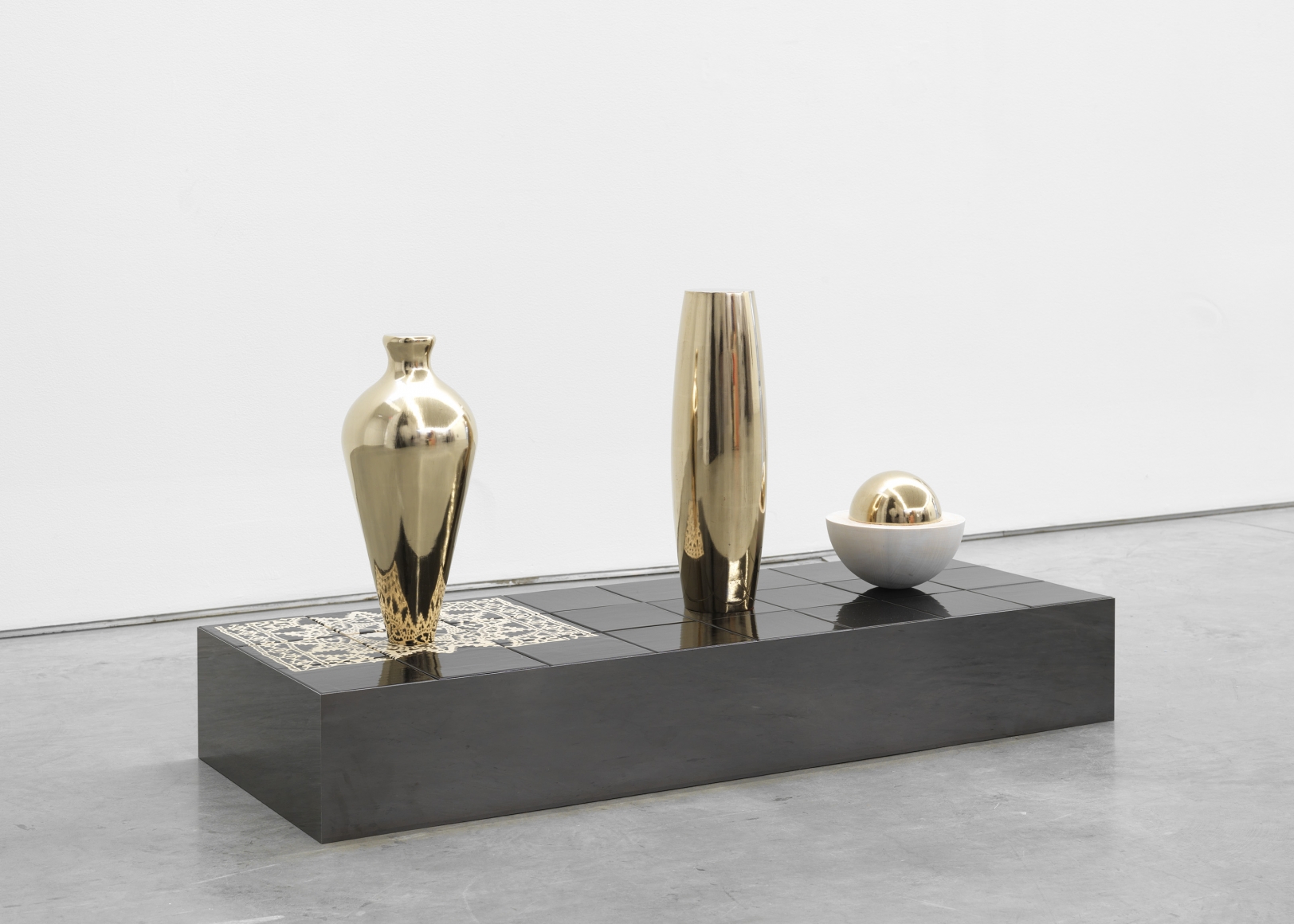 Untitled, 2017 Gold leaf on wood, ceramic, and mirror-polished stainless steel on MDF
