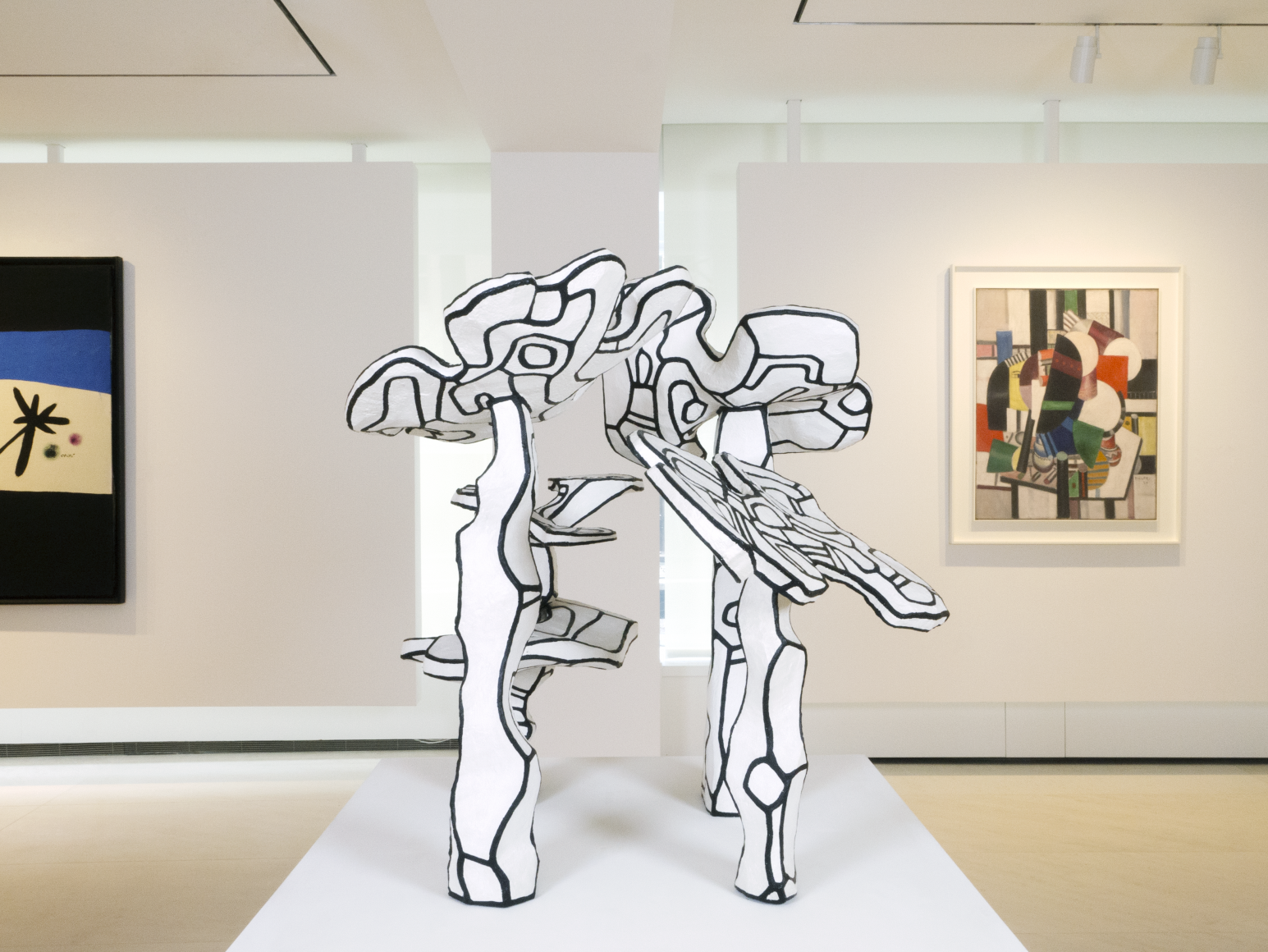 Installation view of Masterworks. ©Helly Nahmad Gallery NY. an hourloupe sculpture by dubuffet depicting four trees
