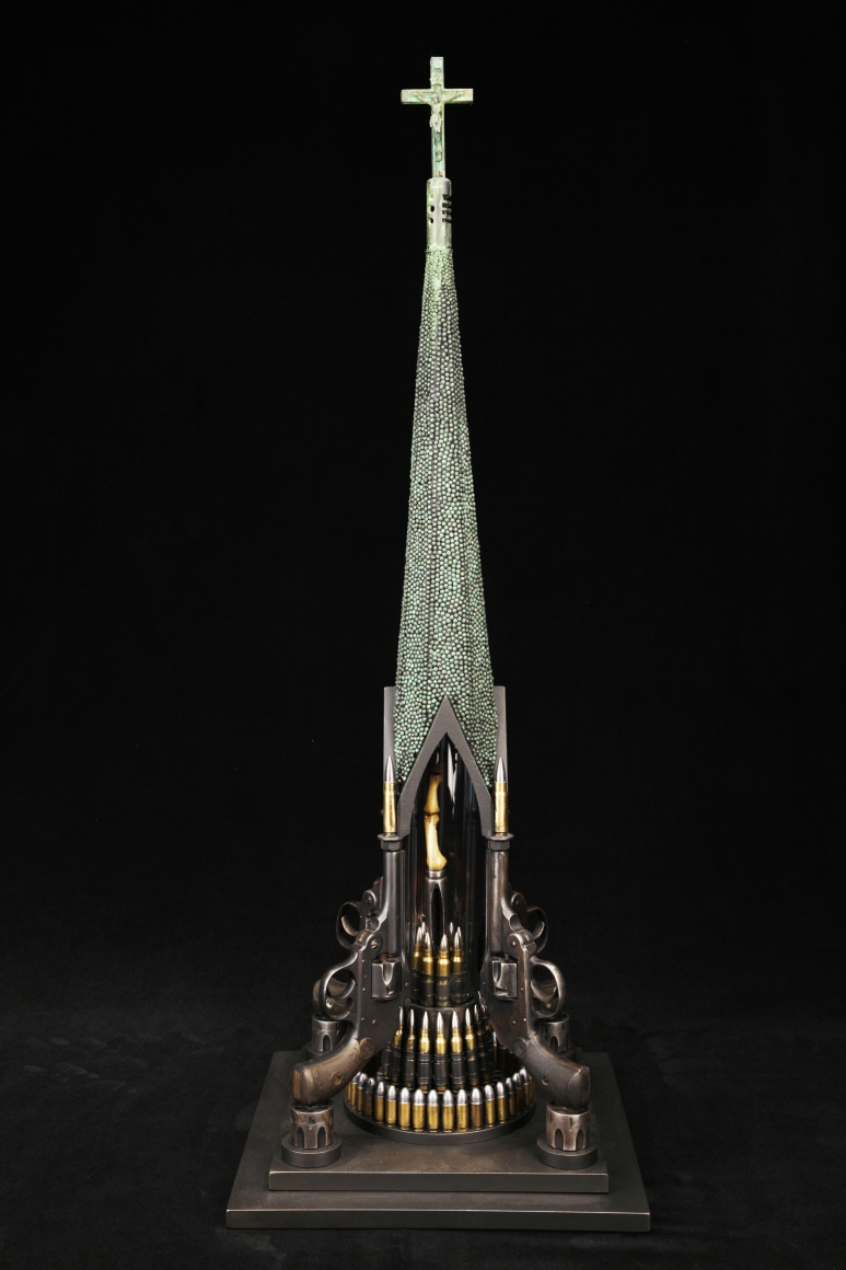 Al Farrow, Trigger Finger of Santo Guerro XX, 2014, guns, bullets, lead shot, steel, glass, bone, crucifix, 30 5/8 x 11 x 11 inches