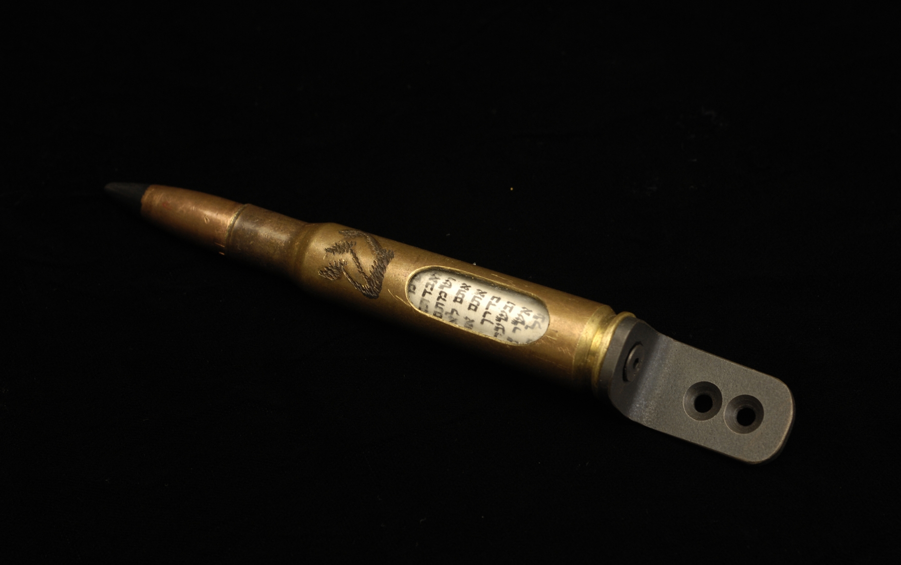 Al Farrow, Mezuzah, 2011, bullets, steel, kosher parchment, 6 3/4 x 3/4 x 3/4 inches