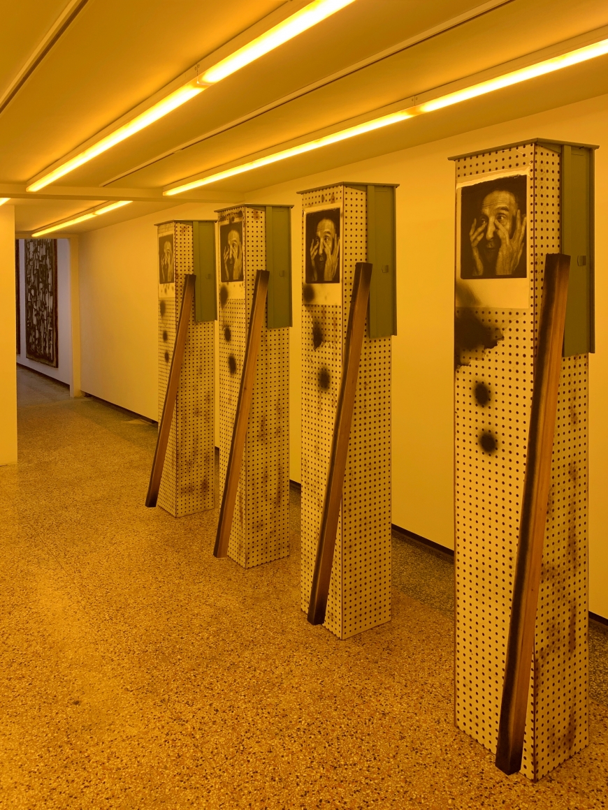 Downstairs back room - Exhibiting four 76 in x 14in x 46in sculptures by Phil Wagner w/ amber gallery lighting.