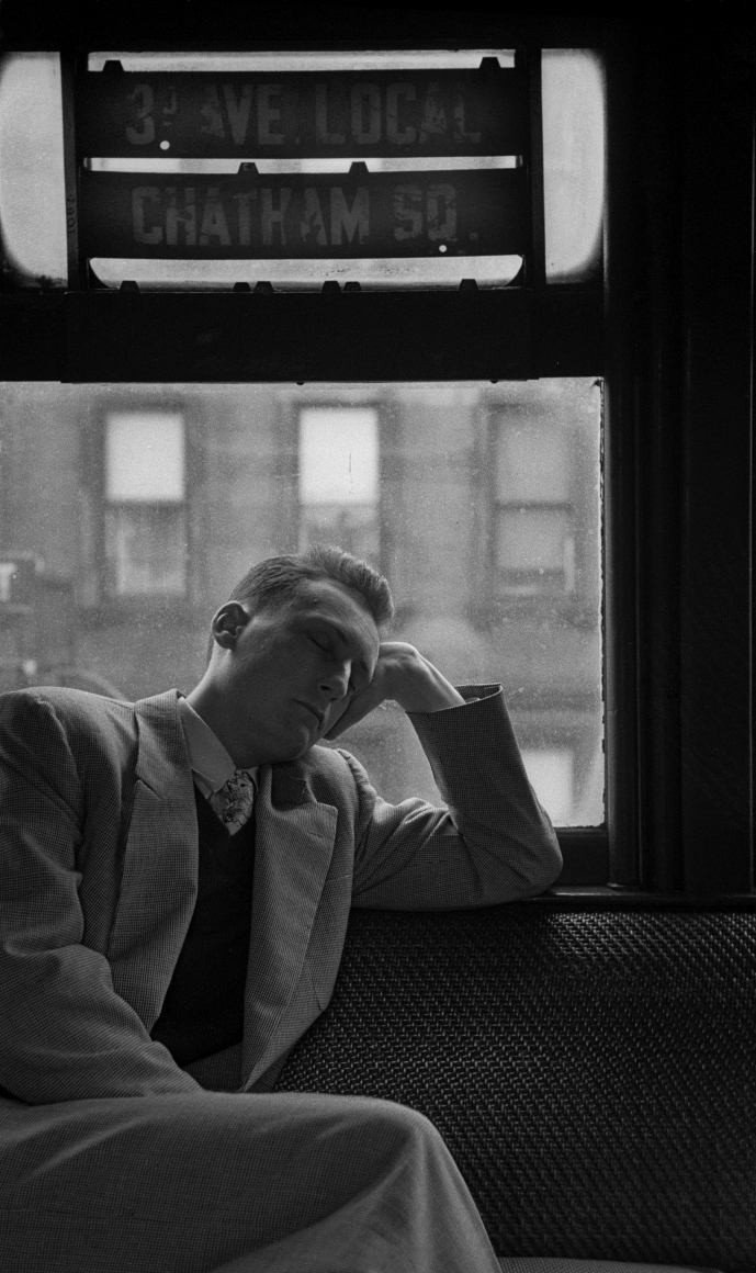 Man sleeping on train by Vivian Cherry