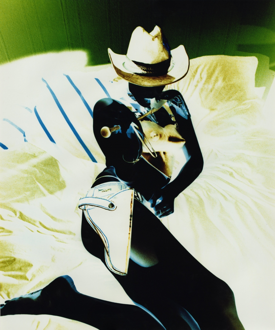 Woman in cowboy hat by Lola Flash