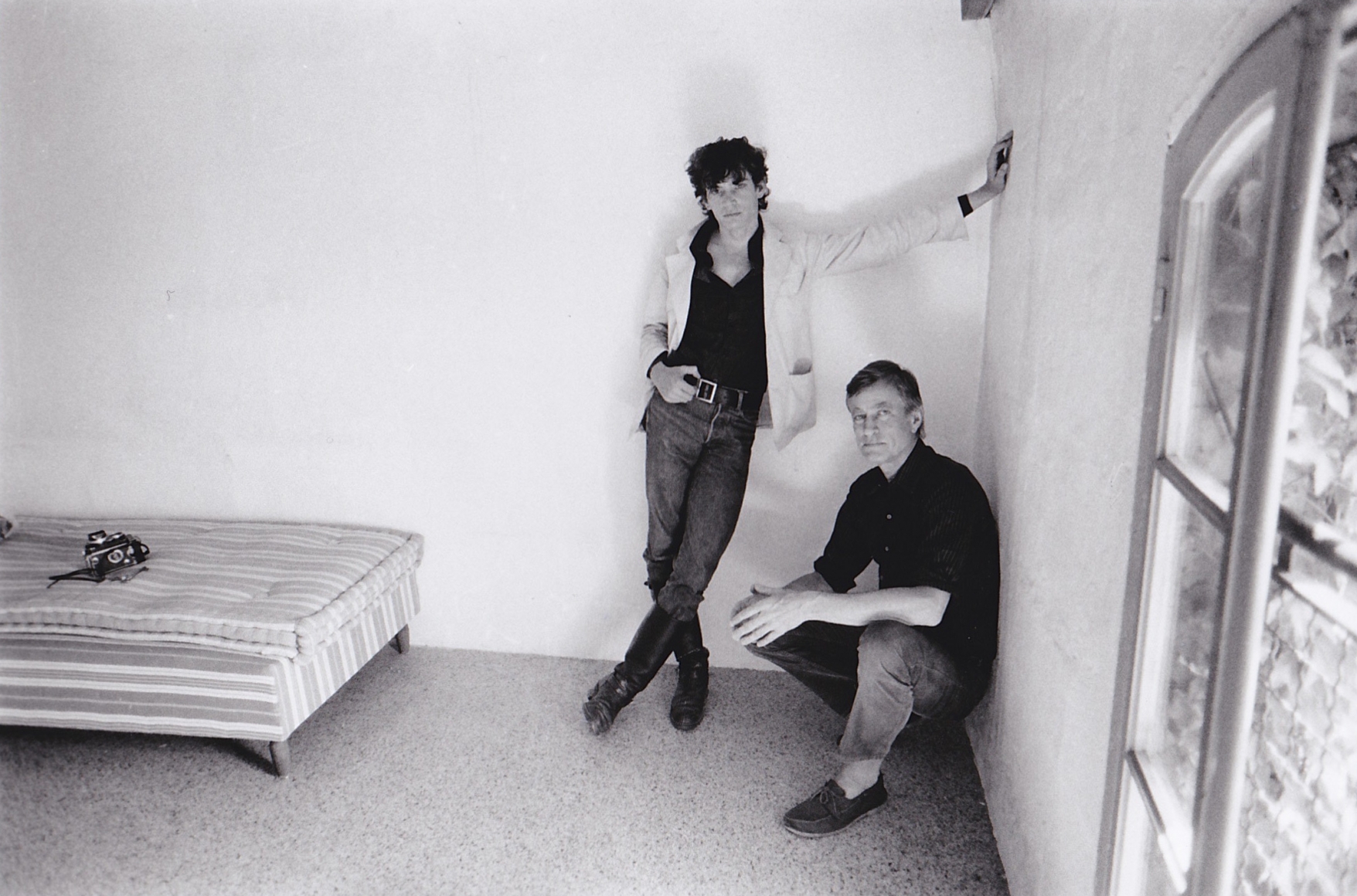 Two men near window by Teresa Engle