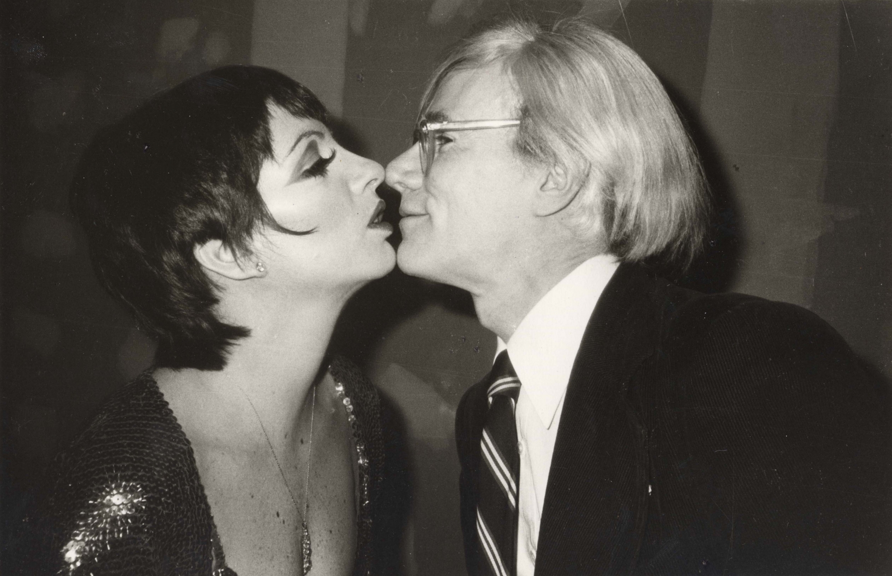 Liza Kissing Andy, 1978 by Christopher Makos