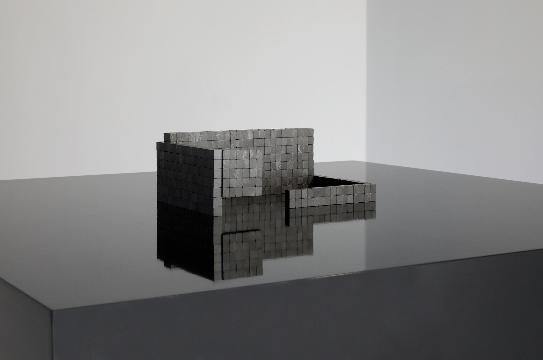 Koo Jeong A. 625, 2020, 625 pieces of Ferrita ceramic magnet Dimensions variable (each magnet: 10 x 10 x 8(h) mm). Courtesy of the artist & PKM Gallery.