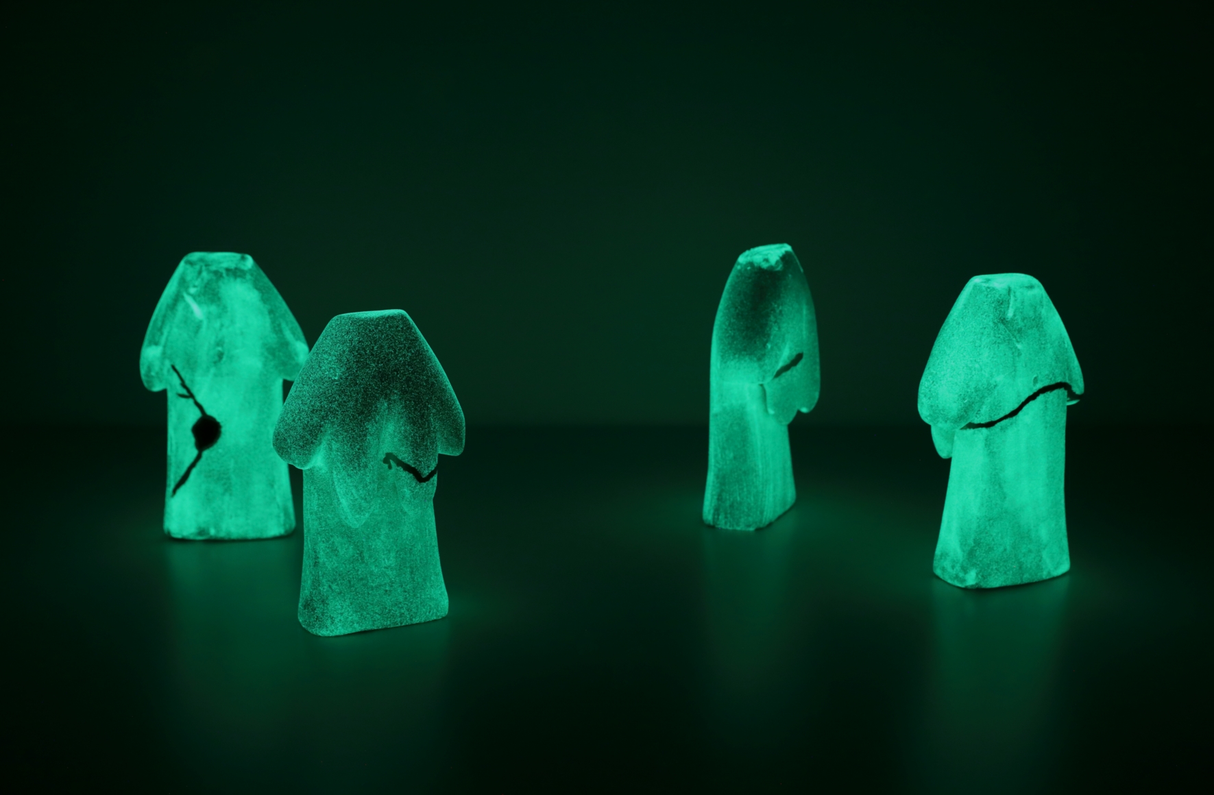 Koo Jeong A. Gossura, Tacit Truth, 2020, 4 ceramic pieces painted with phosphorescent pigment, 18 x 6 x 10.5(h) cm each. Courtesy of the artist & PKM Gallery.