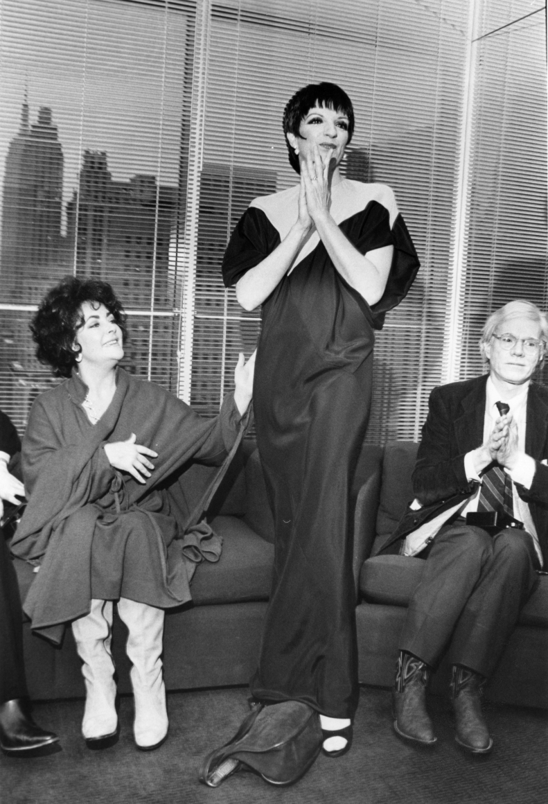 Bill Cunningham - Elizabeth Taylor, Liza Minelli (in Halston) and Andy Warhol, 1979 Gelatin silver print, printed c. 1979 ; Bruce Silverstein Gallery