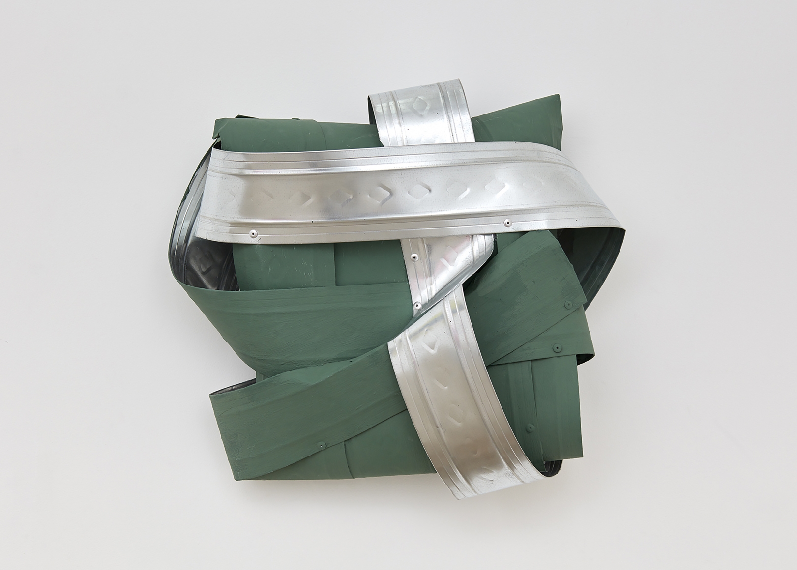 Green and silver aluminum wall-hanging sculpture.